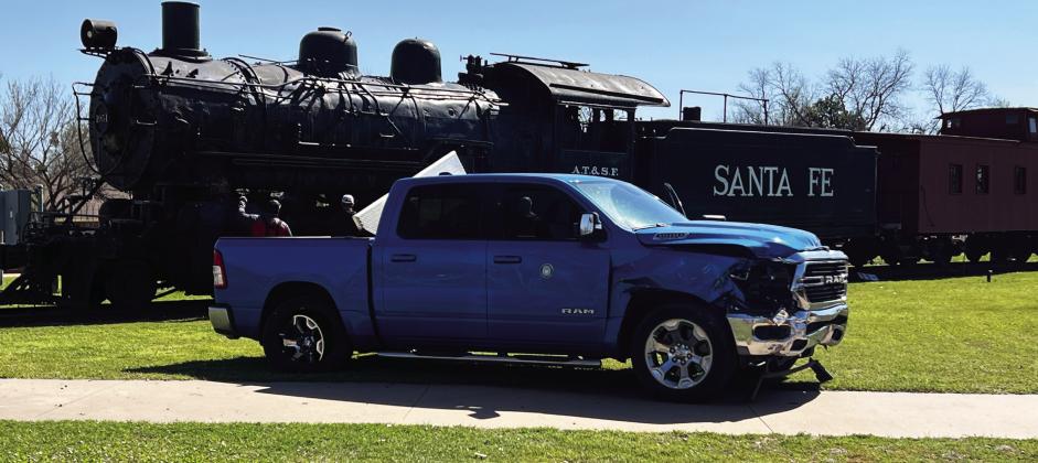 Pauls Valley’s Santa Fe Depot Park was the scene of a single-vehicle accident March 28, after a moment of inattention led to a driver crashing his pickup through the park’s brick and iron fencing. News Star photo by Suzanne Mackey