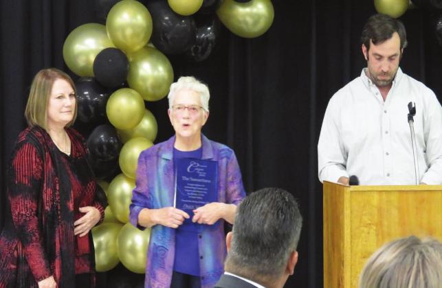 The Pauls Valley Samaritans Food Pantry was named 2020 Corporate Citizen of the Year during the Pauls Valley Chamber of Commerce’s Centennial Celebration Tuesday night. Bonnie Meisel (left) and Lou Hall accepted the award on behalf of Samaritans. Meisel was also named the 2020 Citizen of the Year for her work with the Samaritans Food Pantry during the COVID-19 pandemic last year, as well as her volunteer work with multiple other civic organizations to serve the Pauls Valley community.