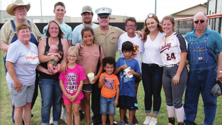U.S. Marine Lane Robison, a 2017 Lindsay graduate, surprised his mom and two sisters when he presented the American flag during “The Star Spangled Banner” prior to the Leopardettes game on August 28. He arrived minutes before the game and dad was in on it. Thanks to the coaches, referees, players and parents who orchestrated this surprise, for it was not an easy task to keep mom and the two sisters from seeing Lane’s arrival.