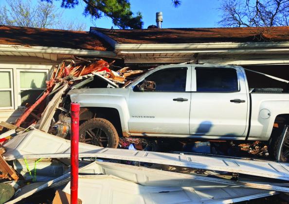A motorist suffering a medical emergency crashed a pickup truck into a residence on State Highway 19 northeast of Pauls Valley early Tuesday morning. No one in the home was injured. The driver was transported to a local hospital for treatment. Photo courtesy of Robert Bittle