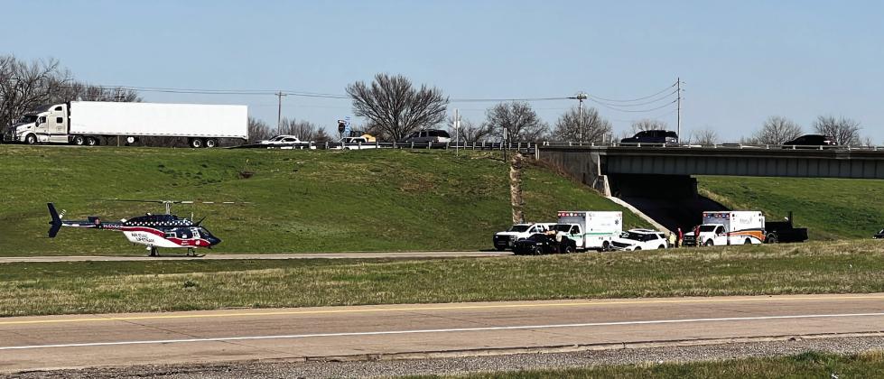 Northbound lanes of I-35 were closed near mile marker 70 for over an hour Monday afternoon as AirEvac crews prepared to transport two people injured in a multi-car collision.  News Star photo by Suzanne Mackey